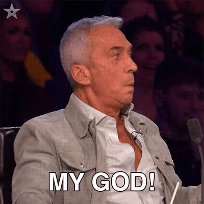 Man Sitting At Microphone Saying My God GIF