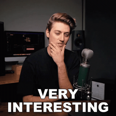 Man Sitting At Microphone Saying Very Interesting GIF