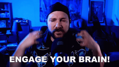 Man Sitting At Microphone Says Engage Your Brain GIF