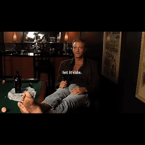 Man Sitting At Pool Table With Let It Ride GIF