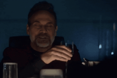 Man Sitting At Table Drinking Wine GIF
