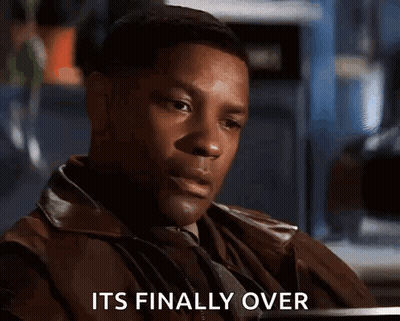 Man Sitting At Table Its Finally Over GIF