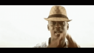 Man Sitting At Table Laughing With Water And Food GIF