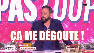 Man Sitting at Table Saying Ca Me Degoute