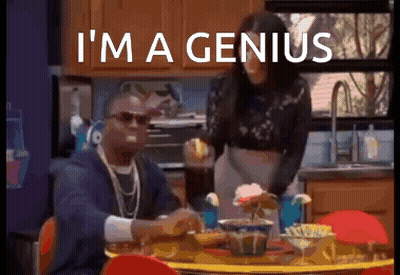 Man Sitting At Table Saying I'm A Genius GIF