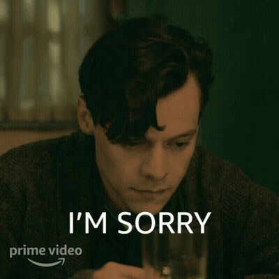 Man Sitting At Table Saying I'm Sorry GIF