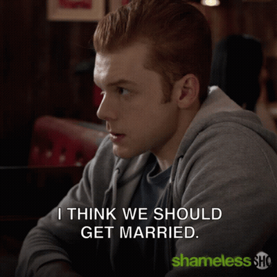 Man Sitting At Table Saying I Think We Should Get Married GIF