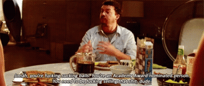 Man Sitting At Table Saying Jonah You're Fucking Sucking Balls GIF