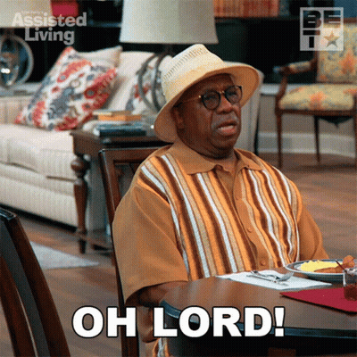 Man Sitting At Table Saying Oh Lord GIF