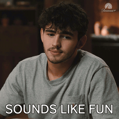 Man Sitting At Table Saying Sounds Like Fun GIF