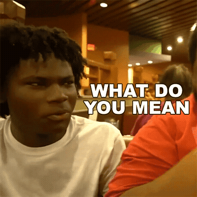 Man Sitting At Table Saying What Do You Mean GIF