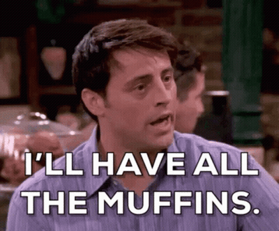 Man Sitting At Table Says I'll Have All The Muffins GIF