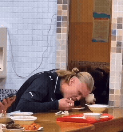 Man Sitting At Table With Bowls Of Food GIF