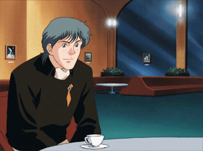 Man Sitting At Table With Coffee GIF