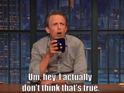 Man Sitting At Table With Cup Saying Um Hey GIF