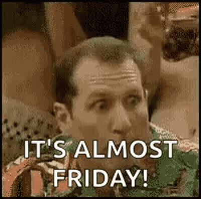 Man Sitting At Table With Drink Saying It's Almost Friday GIF