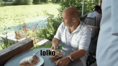 Man Sitting At Table With Food Saying Lolko GIF
