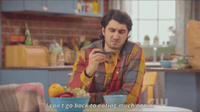 Man Sitting At Table With Fruit Bowl GIF