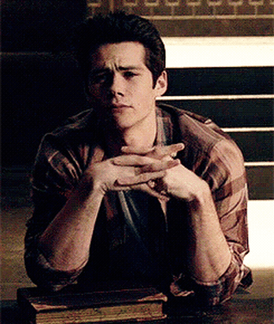 Man Sitting At Table With Hands Folded GIF