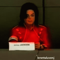 Man Sitting At Table With Jackson Sign GIF