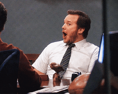 Man Sitting At Table With Mouth Open GIF