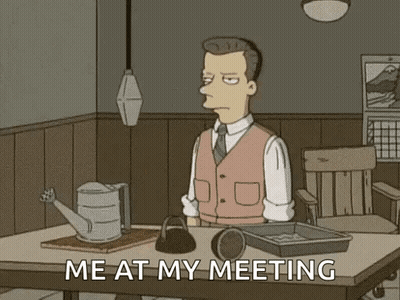 Man Sitting At Table With Newspaper And Watering Can GIF