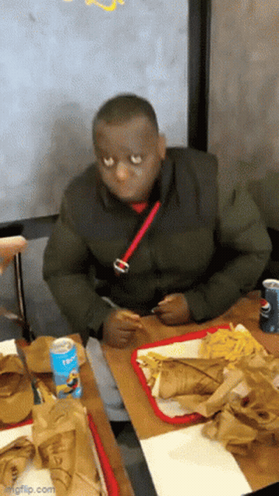 Man Sitting At Table With Pepsi Can GIF