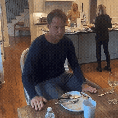 Man Sitting At Table With Plate Of Food GIF