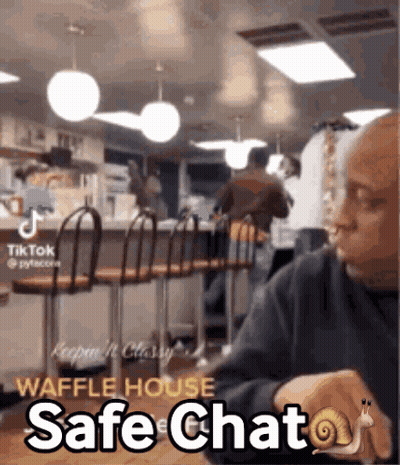 Man Sitting At Table With Snail On Wrist Saying Safe Chat GIF