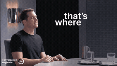 Man Sitting At Table With Text GIF