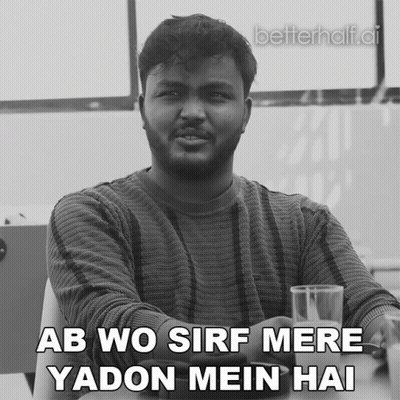 Man Sitting At Table With Water Saying Ab Wo Sirf Mere Yadon Mein Hai GIF