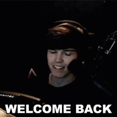 Man Sitting Beside Stuffed Animal Saying We Got New Stuff Coming GIF