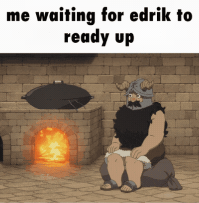 Man Sitting By Fireplace Waiting For Edrik To Ready Up GIF