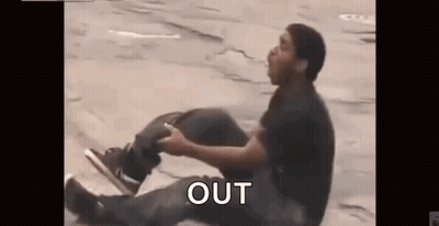 Man Sitting Cross-Legged Saying Out GIF