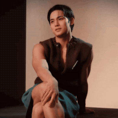 Man Sitting Crossed Legs Hand On Leg GIF