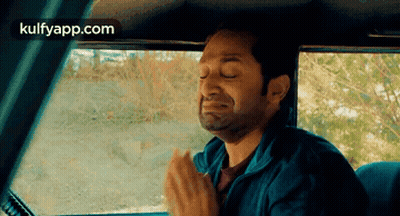 Man Sitting In Back Seat Eyes Closed GIF