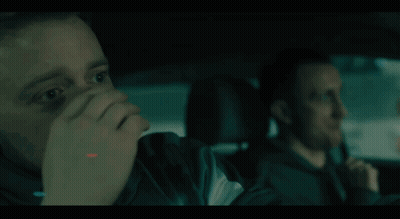 Man Sitting In Back Seat Of Car With Driver GIF