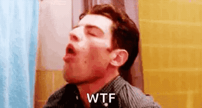 Man Sitting In Bathroom Saying WTF GIF