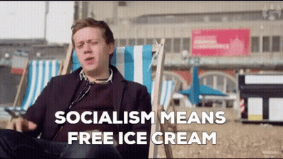 Man Sitting In Beach Chair Saying Socialism Means Free Ice Cream GIF