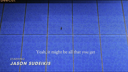 Man Sitting In Blue Seats GIF