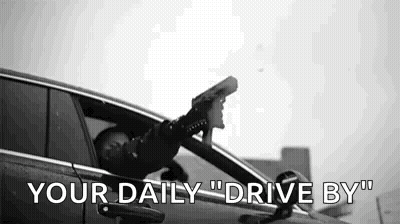 Man Sitting In Car Head Out Window Holding Gun GIF