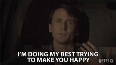 Man Sitting in Car Says I'm Doing My Best Trying to Make You Happy