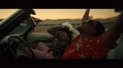 Man Sitting In Car With Arms In Air GIF