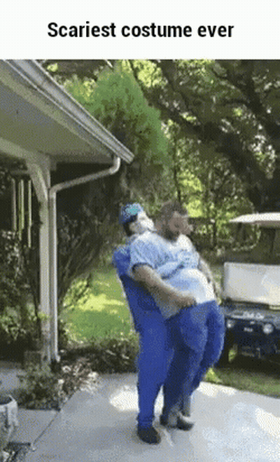 Man Sitting In Car With Cat On Lap GIF