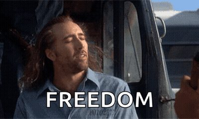 Man Sitting In Car With Freedom Shirt GIF