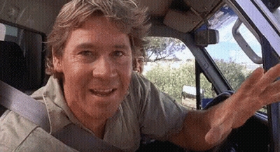 Man Sitting In Car With Hand Out Window GIF