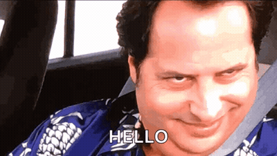 Man Sitting In Car With Hello On Face GIF