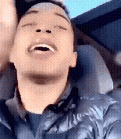 Man Sitting In Car With Mouth Open GIF