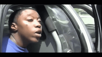 Man Sitting In Car With Mouth Open GIF