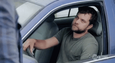 Man Sitting In Car With Showtime On Window GIF